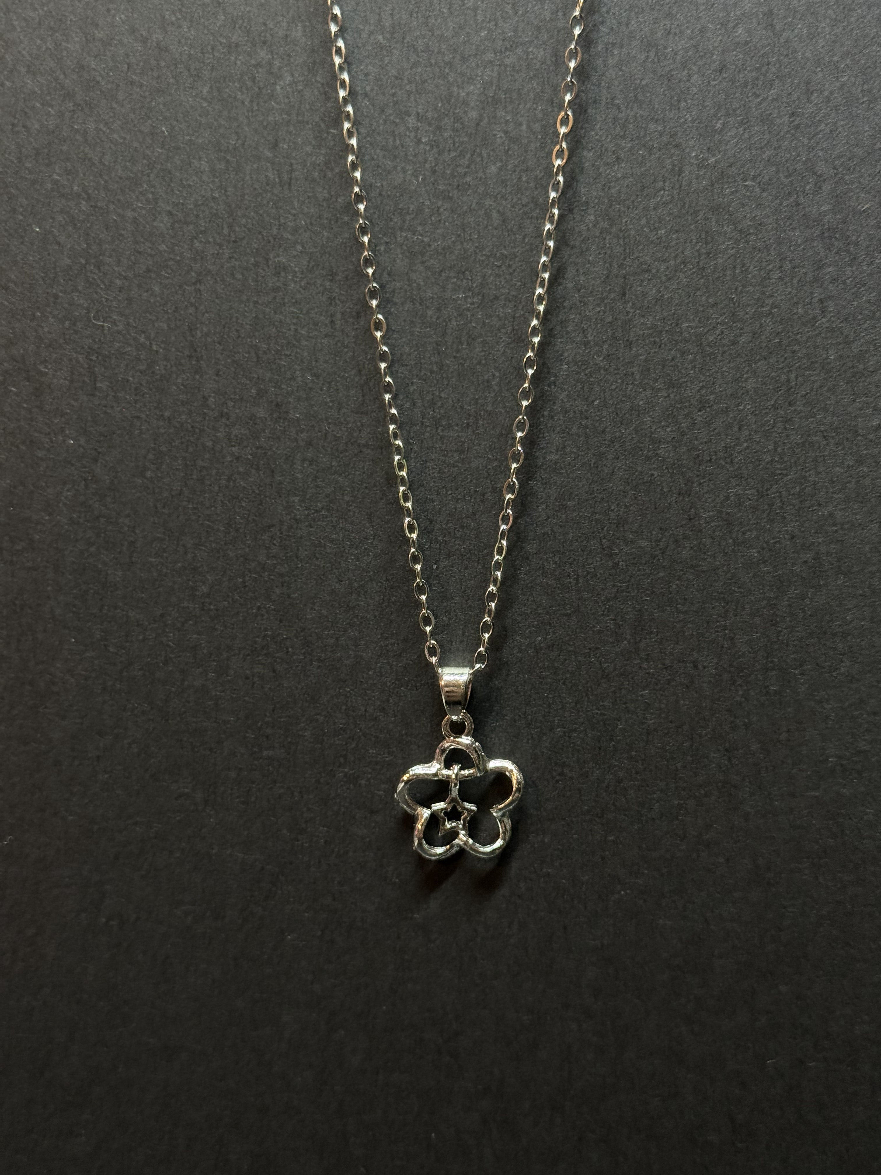 Floral Star Pendant Necklace – 16” Chain